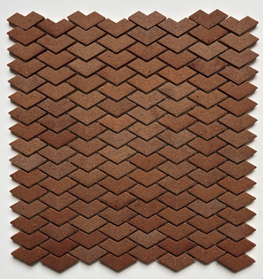 Chevron pattern unglazed mosaic field